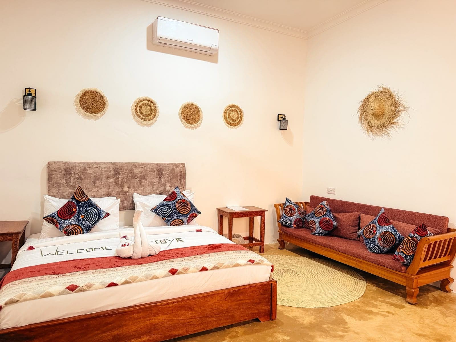 Deluxe guest room photographed from the seating area