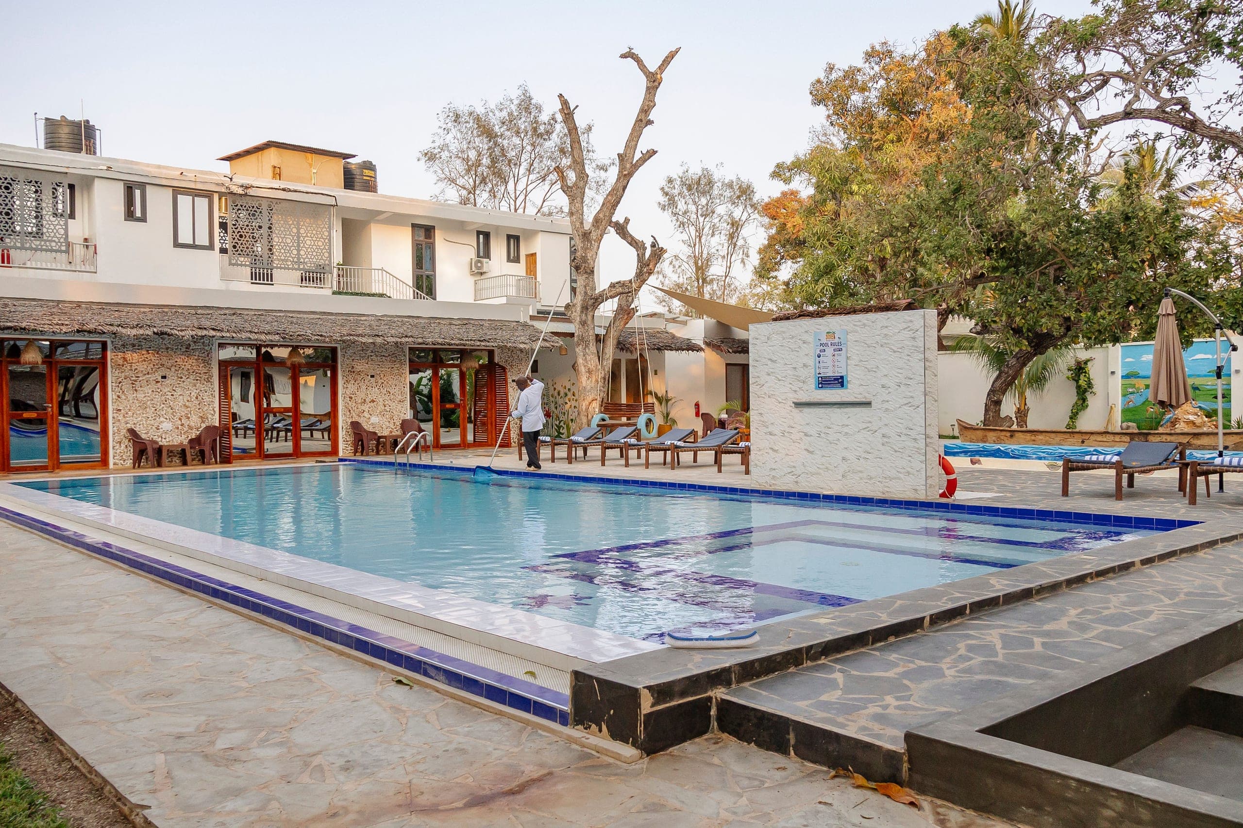Pool terrace with garden planting and shaded seating